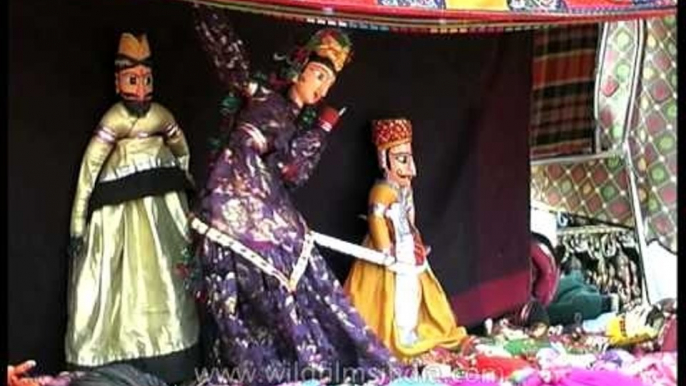 Rajasthani kathputli performing on the folk tunes - Dilli Haat