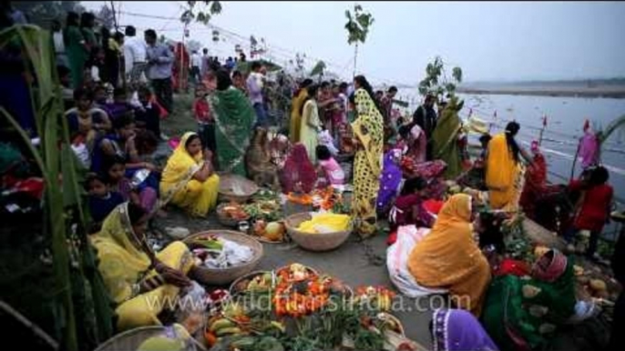 Hindu women devotee performing rituals during the Chhath Puja festival