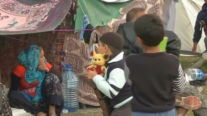 As civilians allowed to flee besieged Syrian town, refugees face hurdles