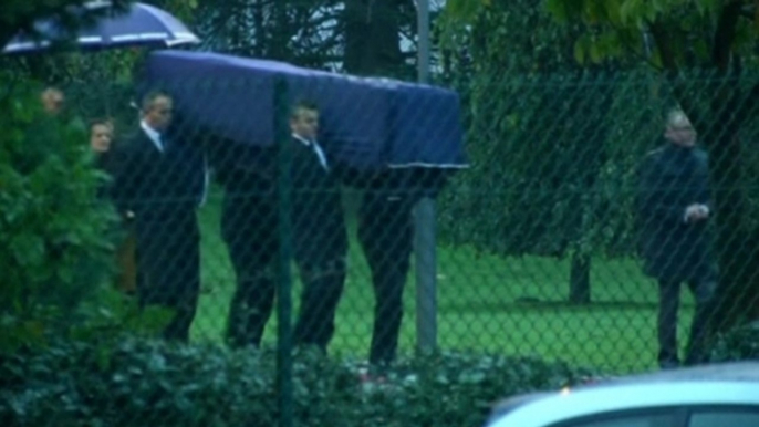 Bodies of journalists arrive in France