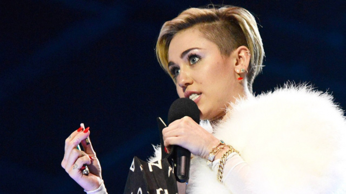 Miley Cyrus Smokes Blunt At MTV EMAs