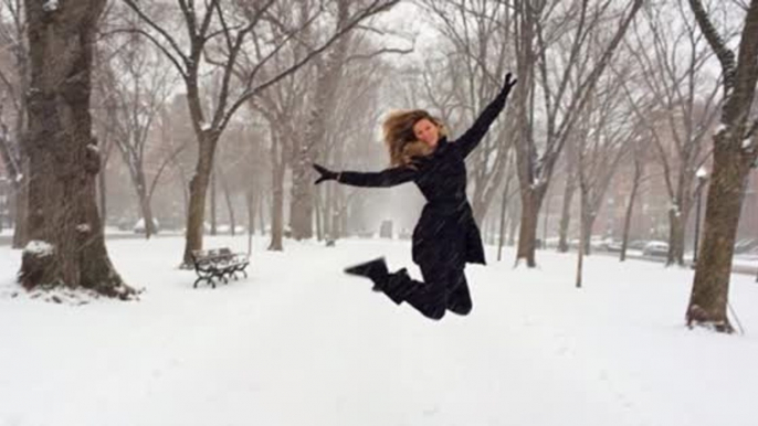 Gisele Bündchen Leaps Around in the Snow