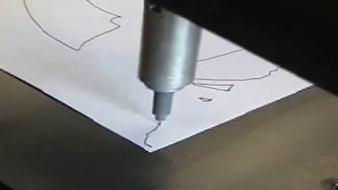 A CNC PLASMA CUTTING TABLE drawing a picture