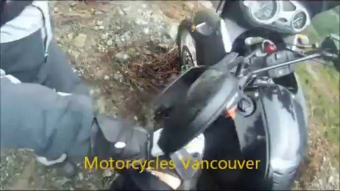 Good Guy Biker Almost Loses another Rider. Sexy Girl almost rides off Cliff.  Read more at http://www.liveleak.com/view?i=97c_1389783067#rgcW269RZ1YyXEsZ.99