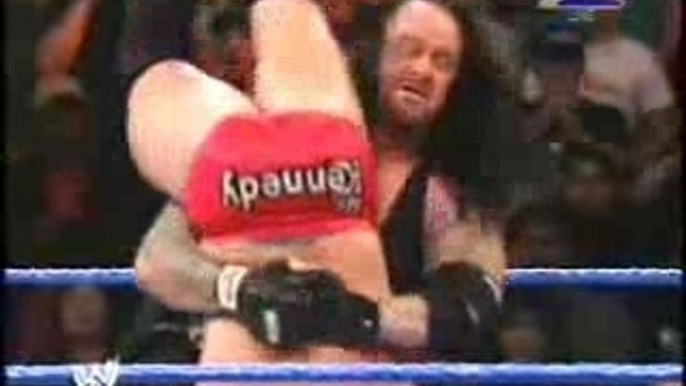 Undertaker destroy refaree & kennedy