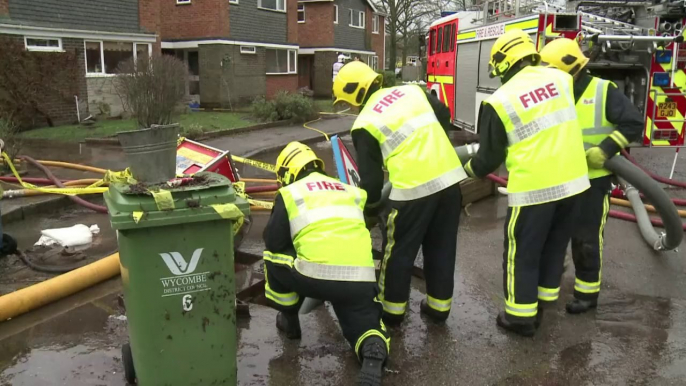 Flooded British communities face further battering from storms