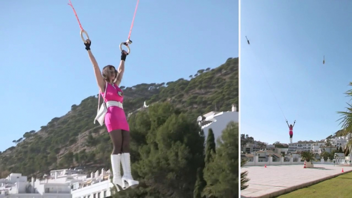 The first ever remote-controlled HUMAN FLIGHT... with helicopters.