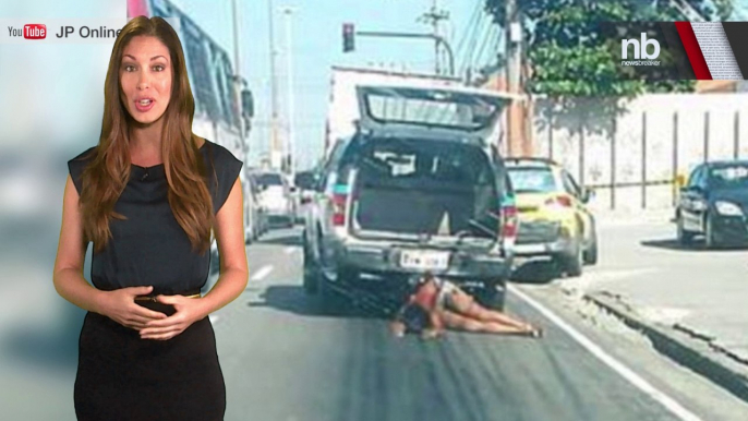 TORTUROUS RIDE: A Brazilian Woman was dragged 900 feet by a Cop Car while her son watched