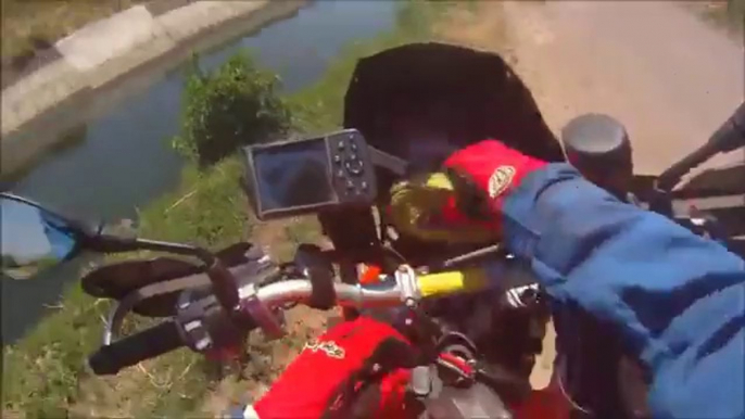 Biker spots something in the water and what happens next... will make you cry!