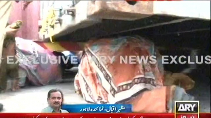 People Crawling Under PMLN Placed Containers