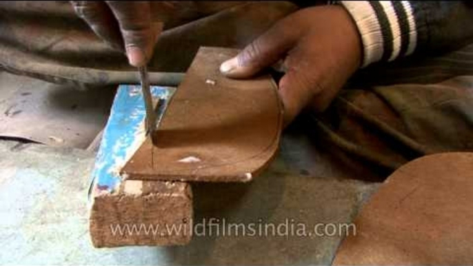 Hand-made leather boots being made from scratch