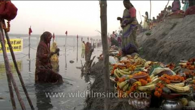 Hindu devotees pray to Sun God as part of the Chhath puja, Delhi