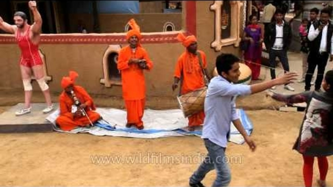 Visitors dancing to Indian music at Surajkund International Crafts Mela