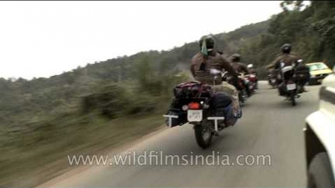 Royal Enfield riders trailing up the National Highway in Nagaland