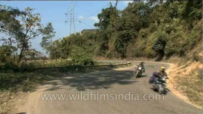 Royal Enfield enthusiasts drive through at NERM 2012, Nagaland