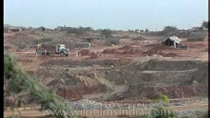 Stone quarrying in the Aravalli hills in Delhi, India