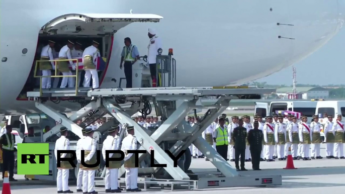 Malaysia: MH17 bodies arrive for national day of mourning