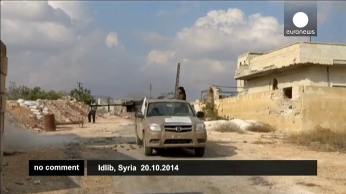 Free Syrian Army rebels battle Syrian regime forces