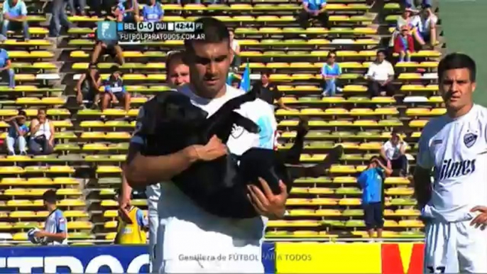 So cute dog ran onto a soccer field to have a belly rub!