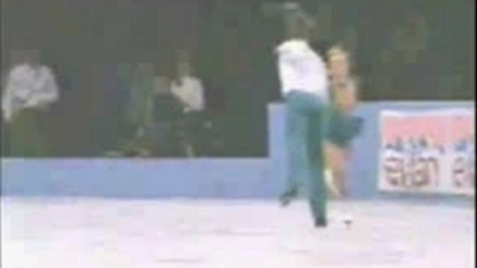 Ice skater falls hard