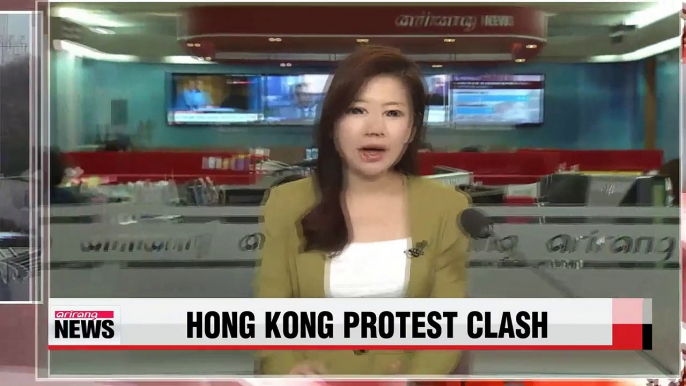 Dozens arrested as police remove barricades in Hong Kong protest site