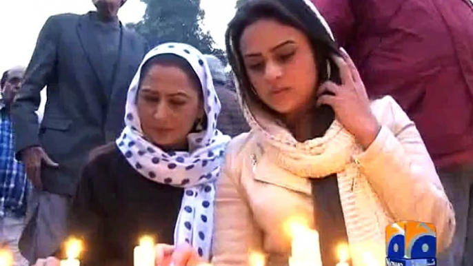 Artists lighten up candles in remembrance of Martyrs-Geo Reports-18 Dec 2014