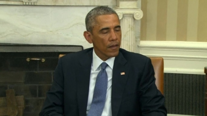 Obama condemns 'cowardly, evil' attack in Paris