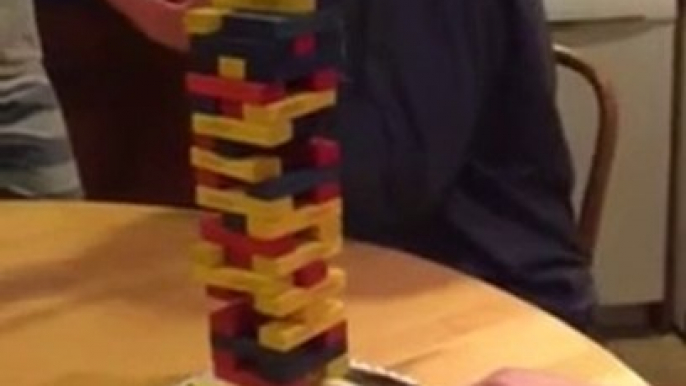 Drunk guy doing crazy Jenga Knife Shot