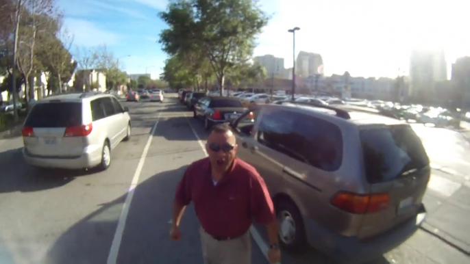 Violent road rage after this Driver cuts off cyclist line!