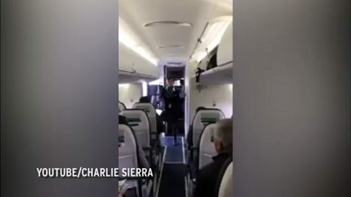 Watch a Flight Attendant Entertain Passengers by Dancing