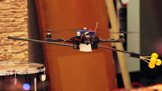 Robot Quadrotors Perform James Bond Theme