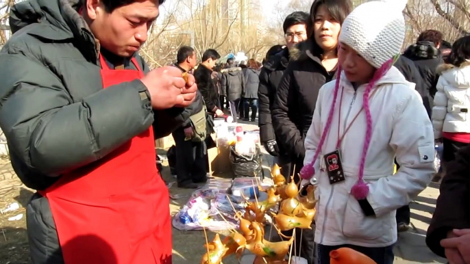 Art of Sugar Blowing: How Chinese Street Artists Create Sugar Animals in Beijing