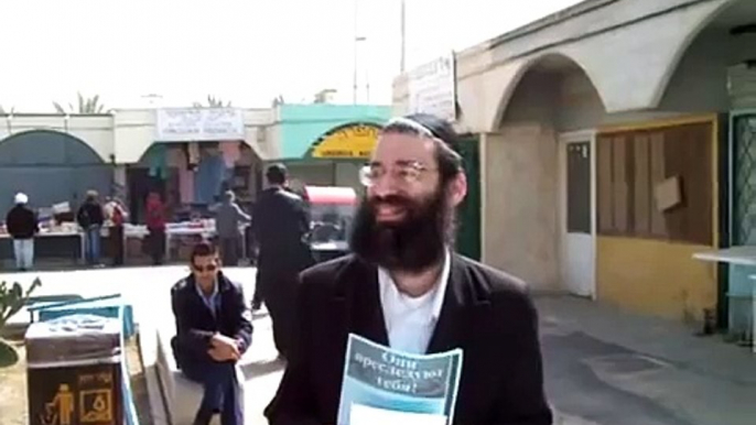 Orthodox Jews harassing Christians outside a Christian shop