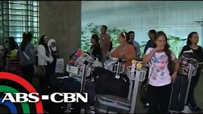 Why some OFWs in Syria can't go home