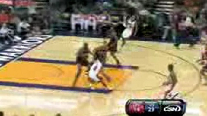 Monta Ellis spins around Luol Deng and finishes with a lay u