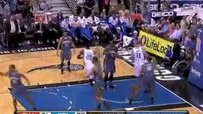 Two Magic players go up for the putback but Mickael Pietrus