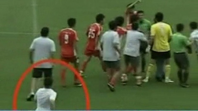 Chinese football fan karate kicks ref