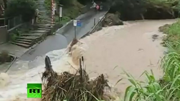 Video: Mud rivers flow as flash floods hit Italy