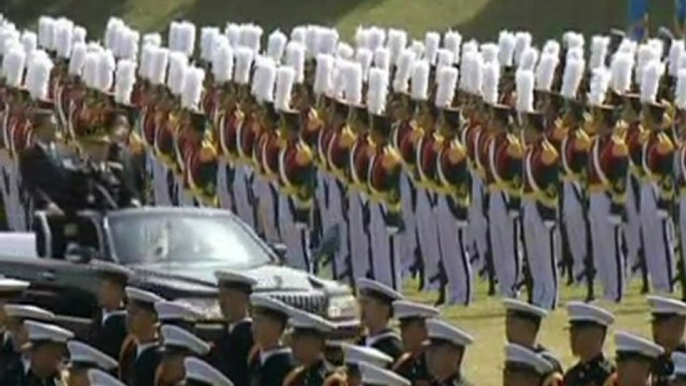 MILITARY DAY: South Koreans smash bricks with their heads