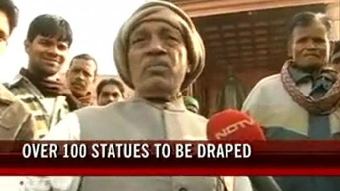 Election Commission's 'operation cover-up' of Mayawati statues divides many