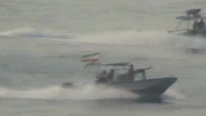 Iranian speed boats approach US ships