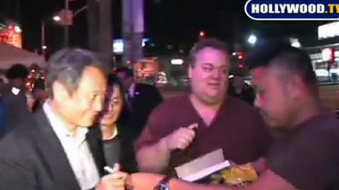 Ang Lee Signs Autographs For Fans.