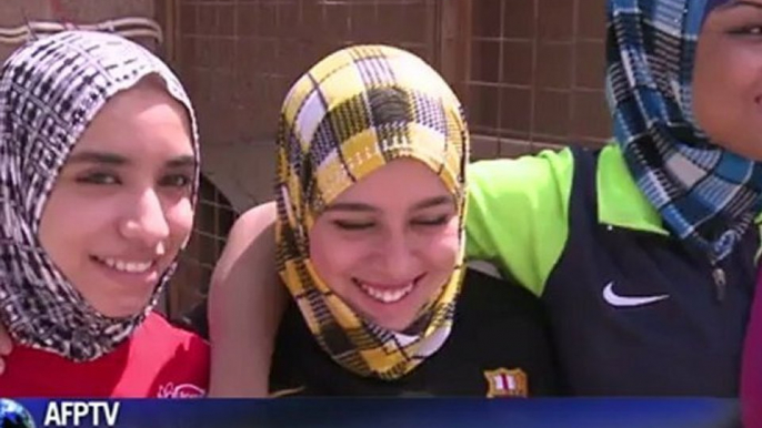 Weightlifting: Iraqi girls raise weights and eyebrows