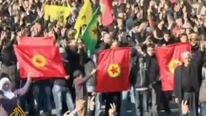 Angry Kurds bury victims of Turkish attack