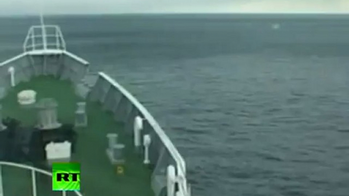 Tsunami Climbing: Incredible video of ship heading into wave in Japan