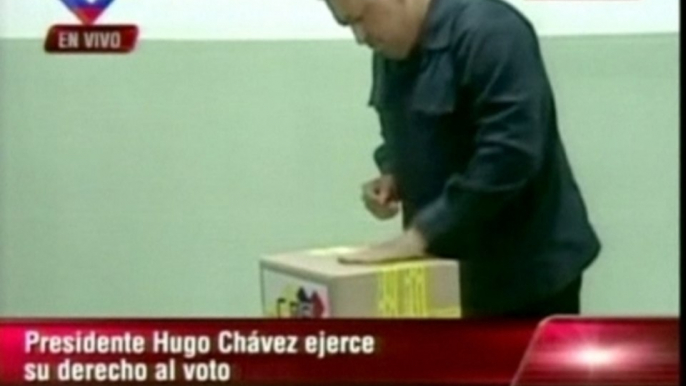 President Hugo Chavez casts his ballot in Venezuela's election