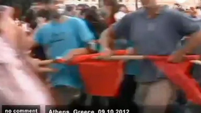 Anti-Merkel protests turn violent in Athens - no comment