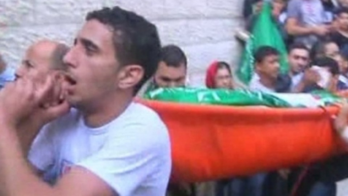 Gazans mourn dead as Israelis praise 'Iron Dome'