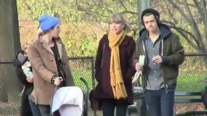 Taylor Swift and Harry Styles Cuddle a Friend's Baby On Romantic Stroll