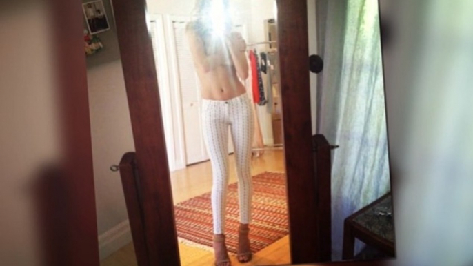 Topless Rosie Huntington-Whiteley Flaunts Her Abs in White Jeans